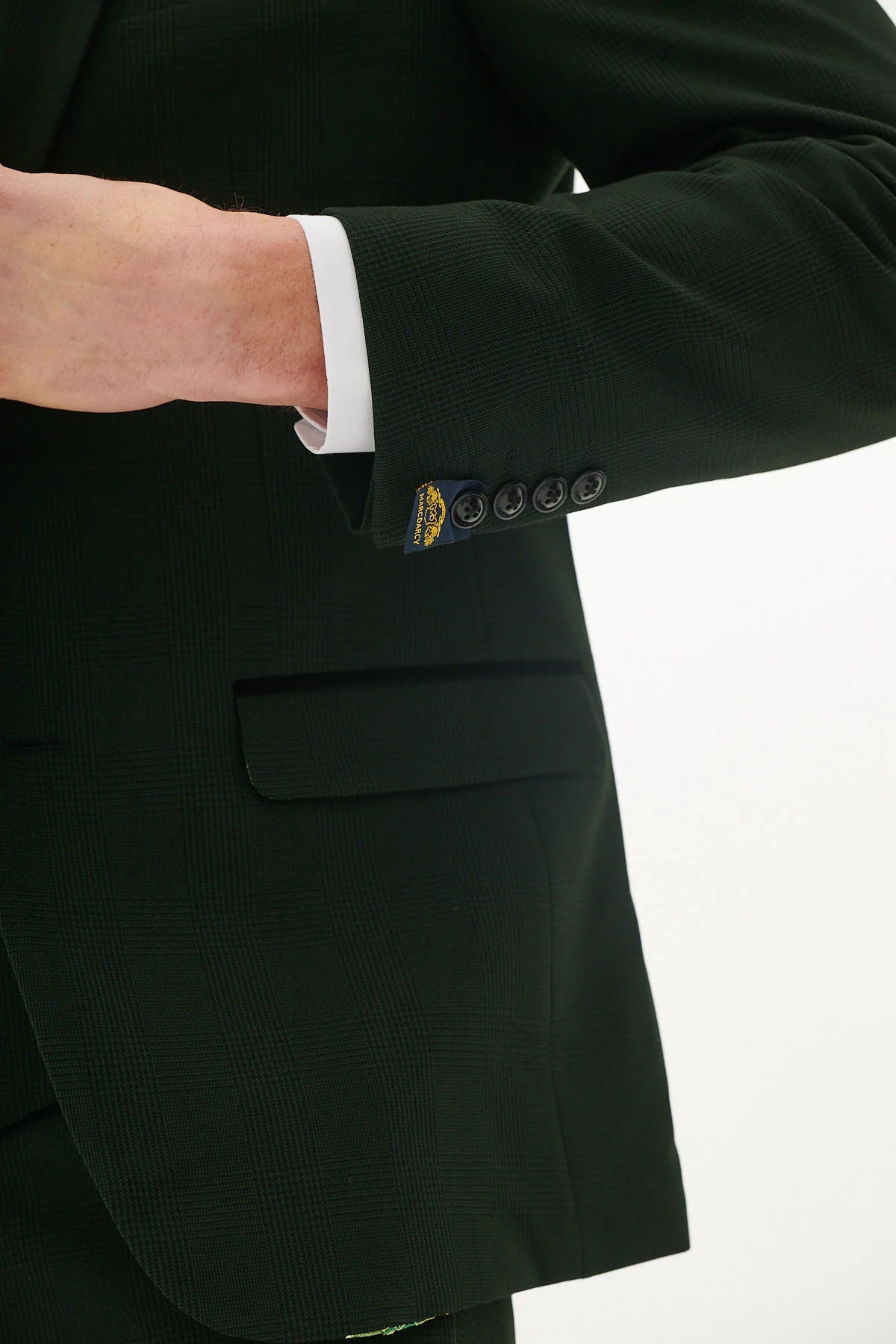 A pair of marine navy check trousers with a Prince of Wales style check pattern, featuring tan buttons and a slim fit.