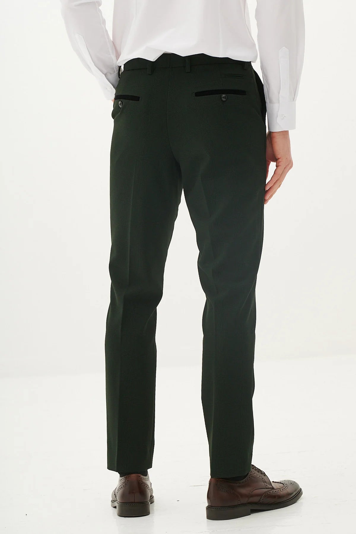 A pair of marine navy check trousers with a Prince of Wales style check pattern, featuring tan buttons and a slim fit.