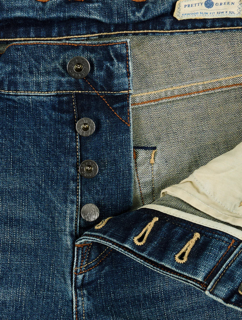 Faded jeans on a white background