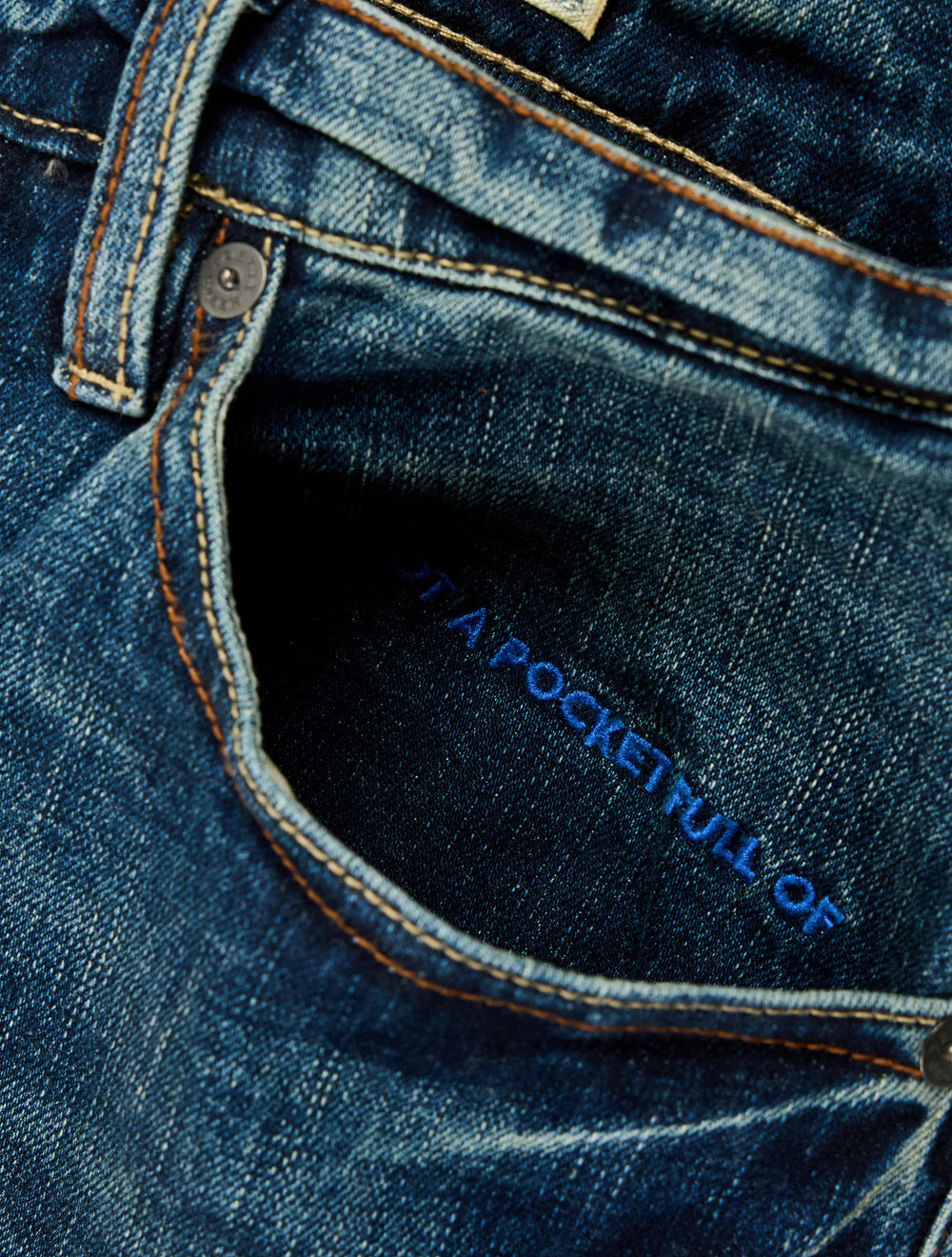 Faded jeans on a white background