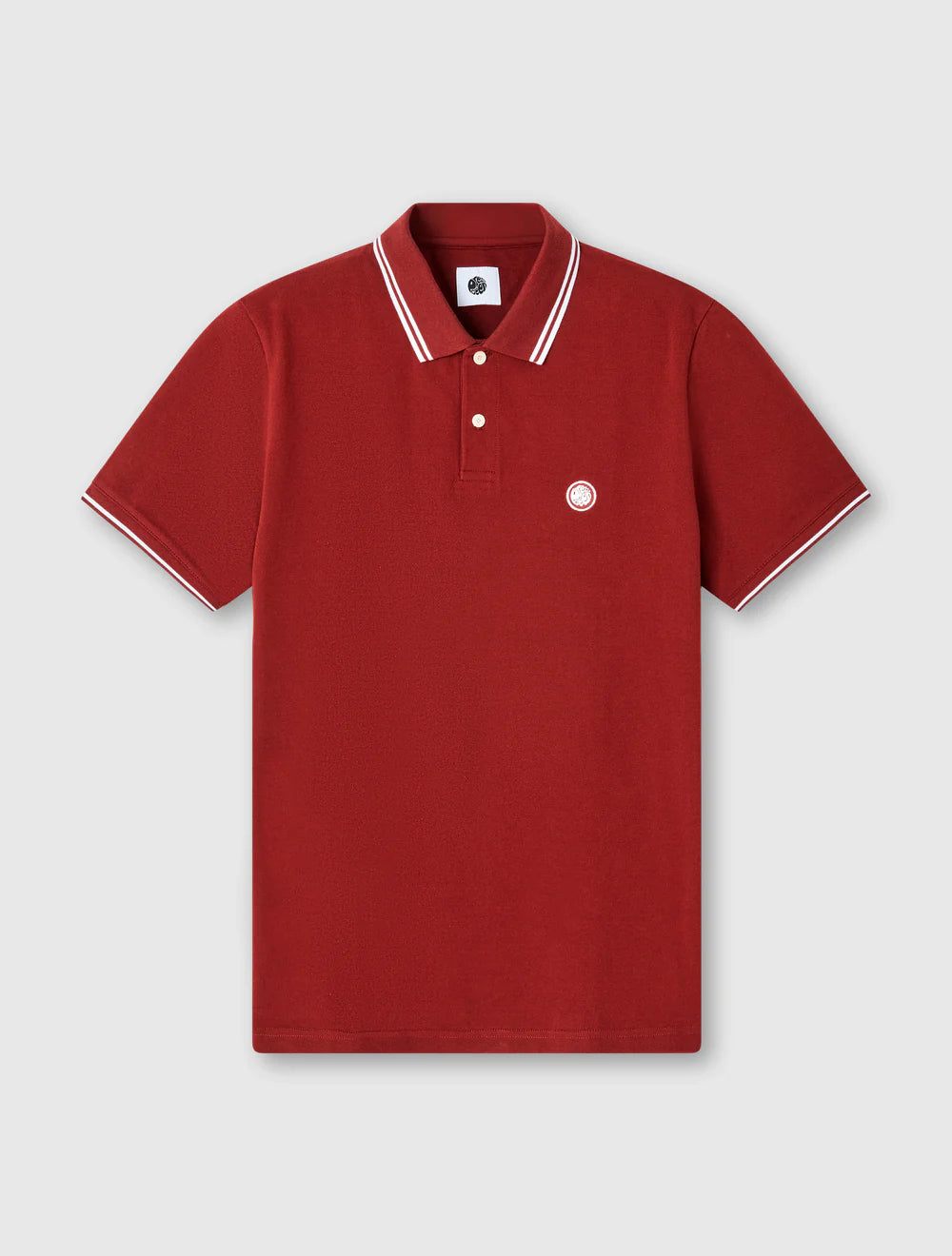 Red polo shirt with white trim on a light gray background