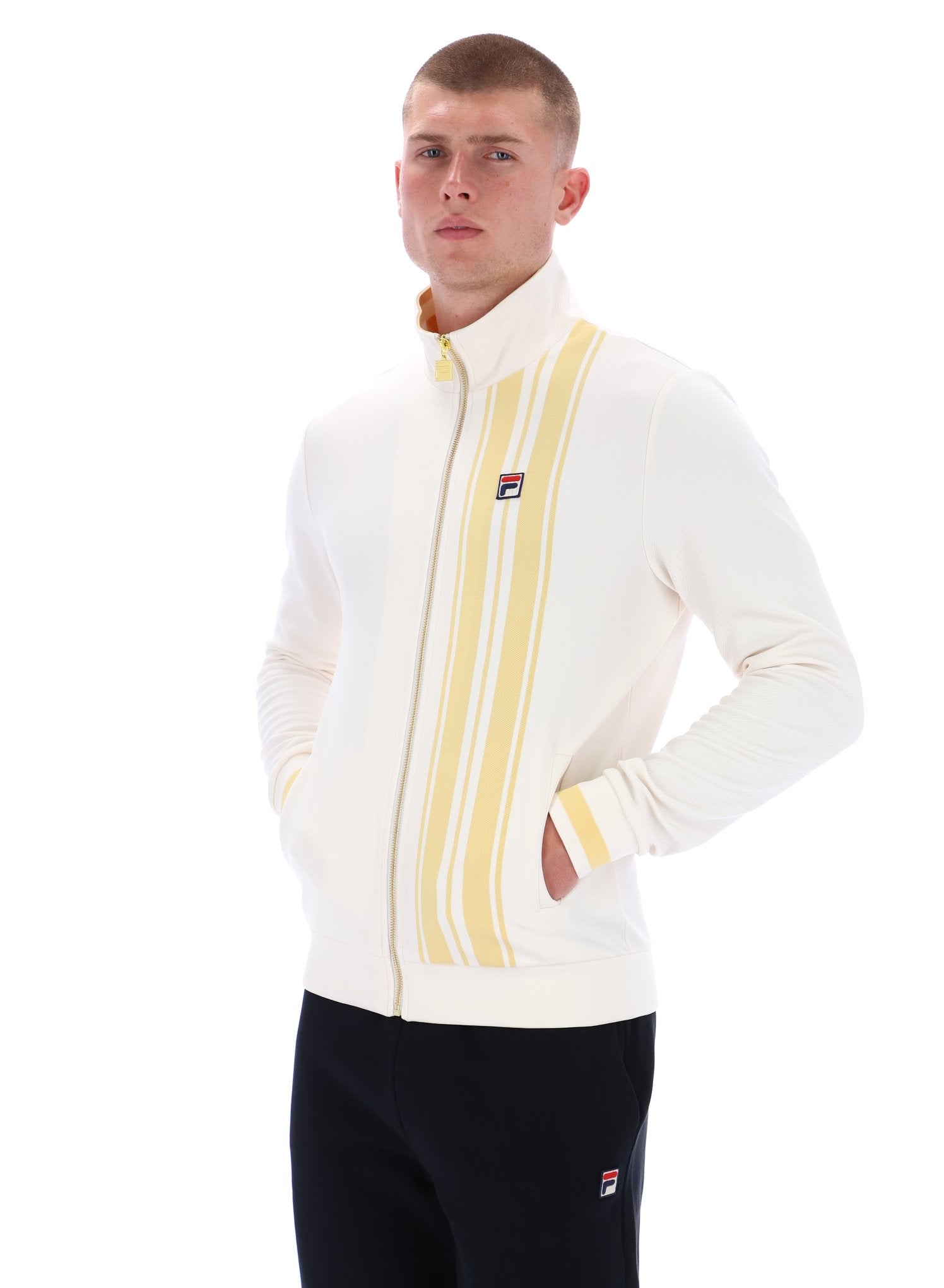 Man wearing a white and yellow striped sweater with a brand logo on a white background