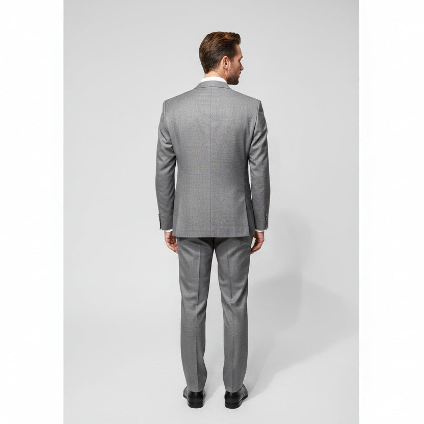 Gray suit on a mannequin in a clothing store.