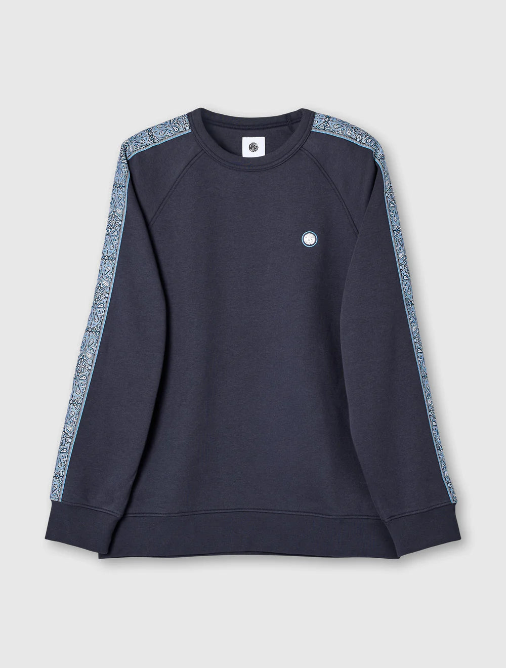 Navy blue sweatshirt with patterned sleeves on a light gray background