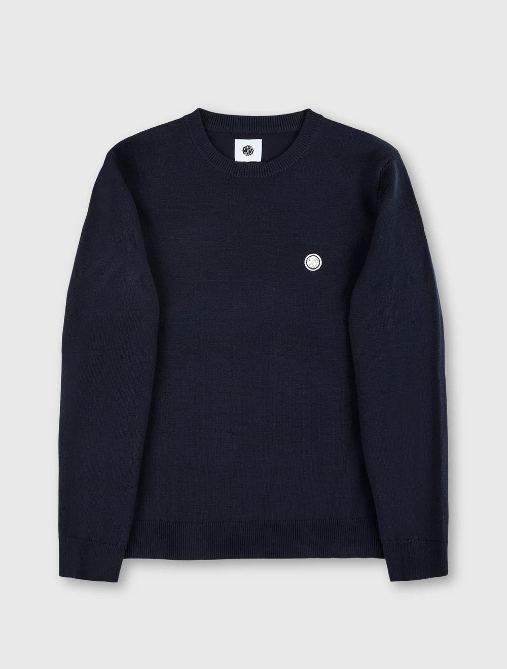 Navy blue sweatshirt with a small white logo on a light gray background