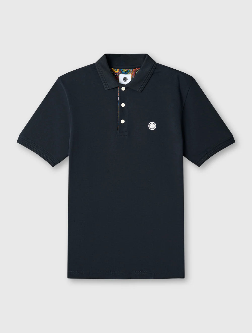 Black polo shirt with brand logo on a light gray background