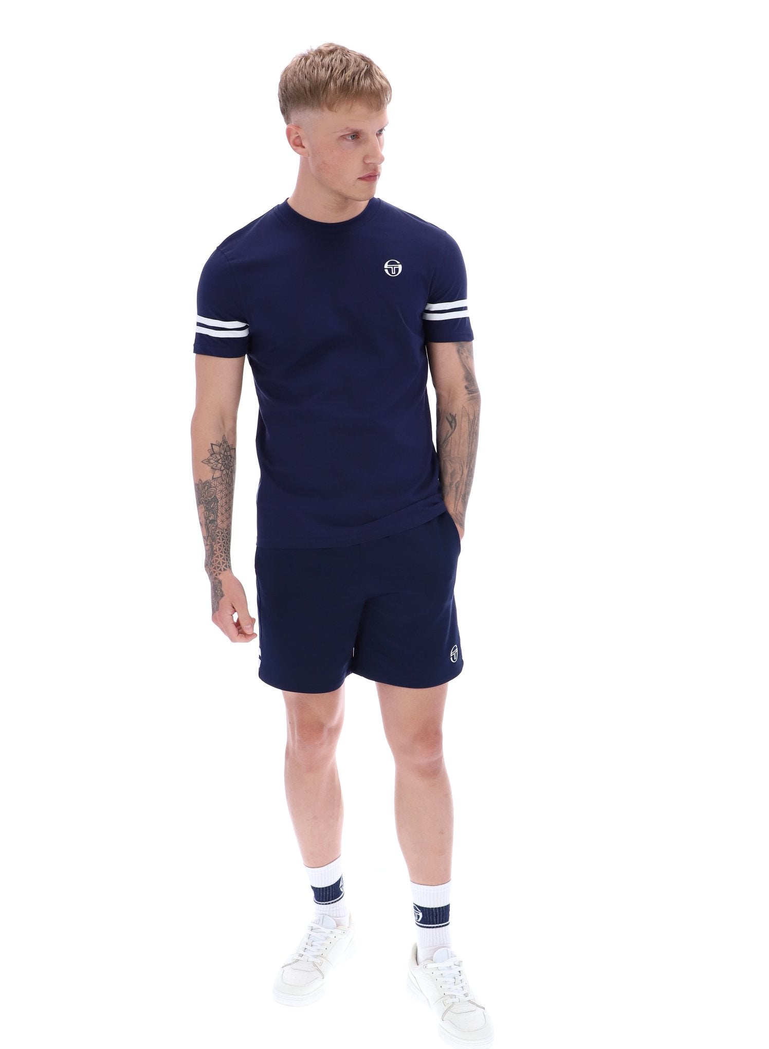 A Sergio Tacchini Grello T-shirt in maritime blue and white with embroidered logo, ribbed neckline and cuffs, and contrasting arm stripes.