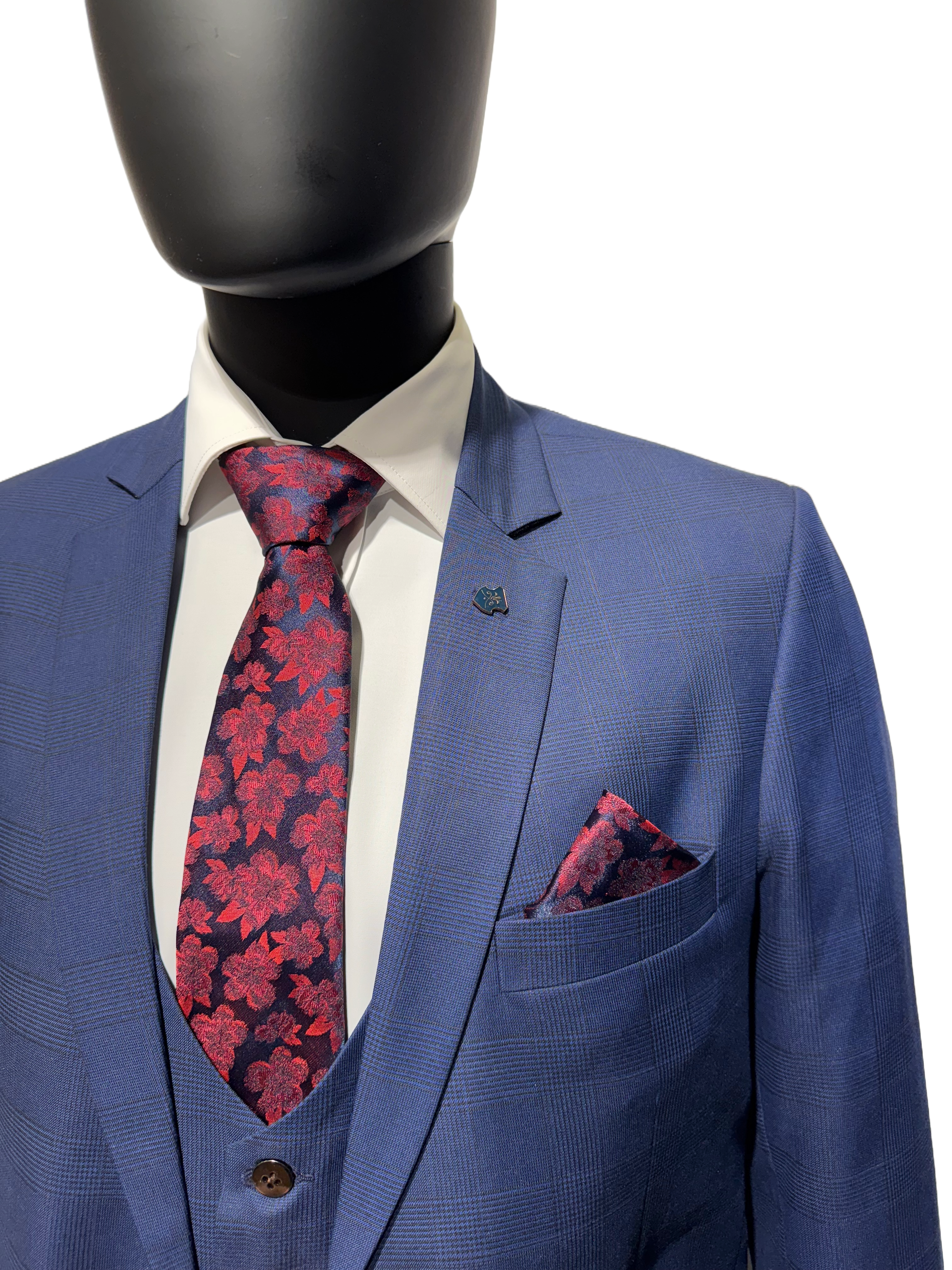 Blue suit on a mannequin against a white background