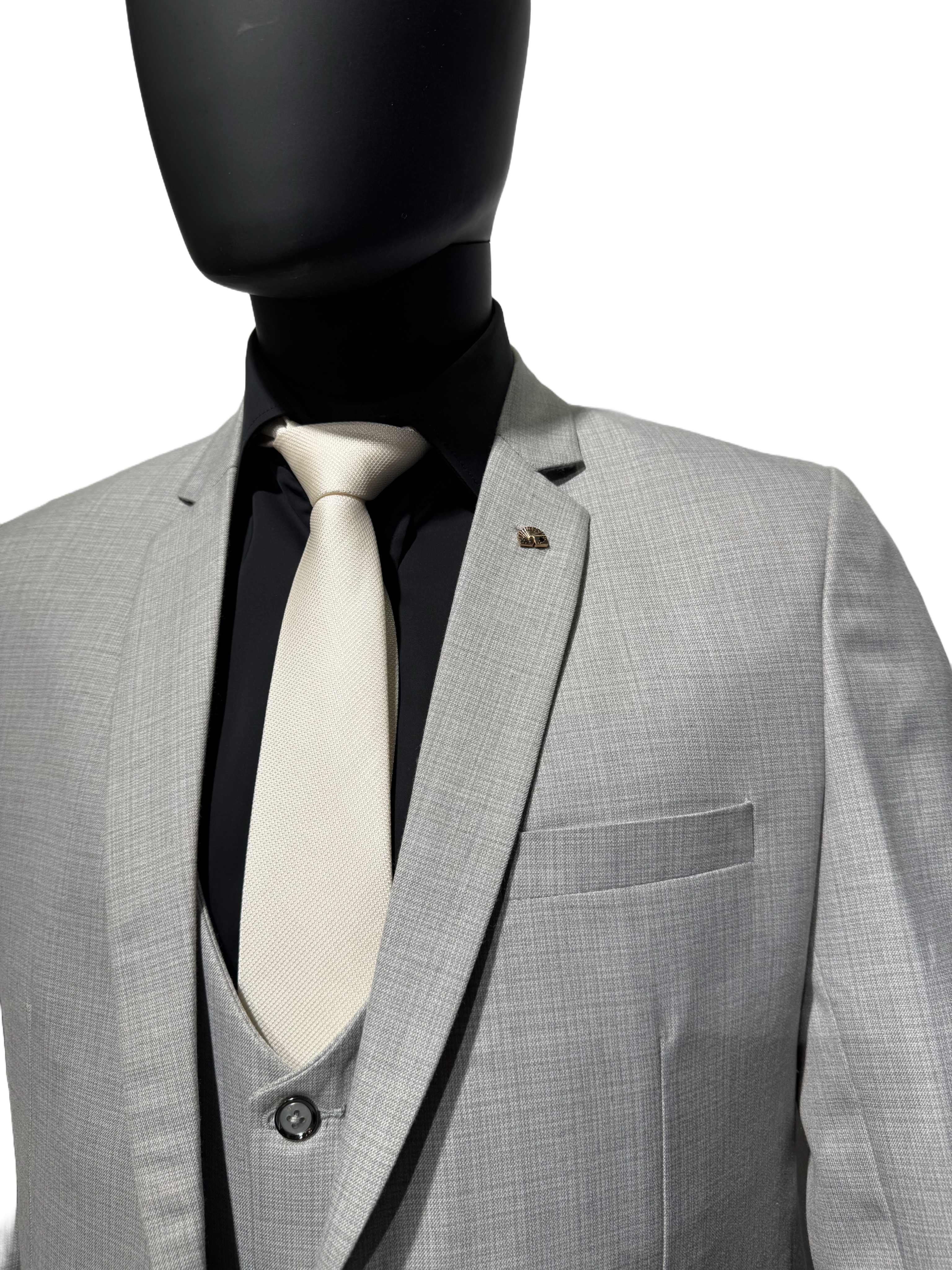 Grey suit on a mannequin against a white background
