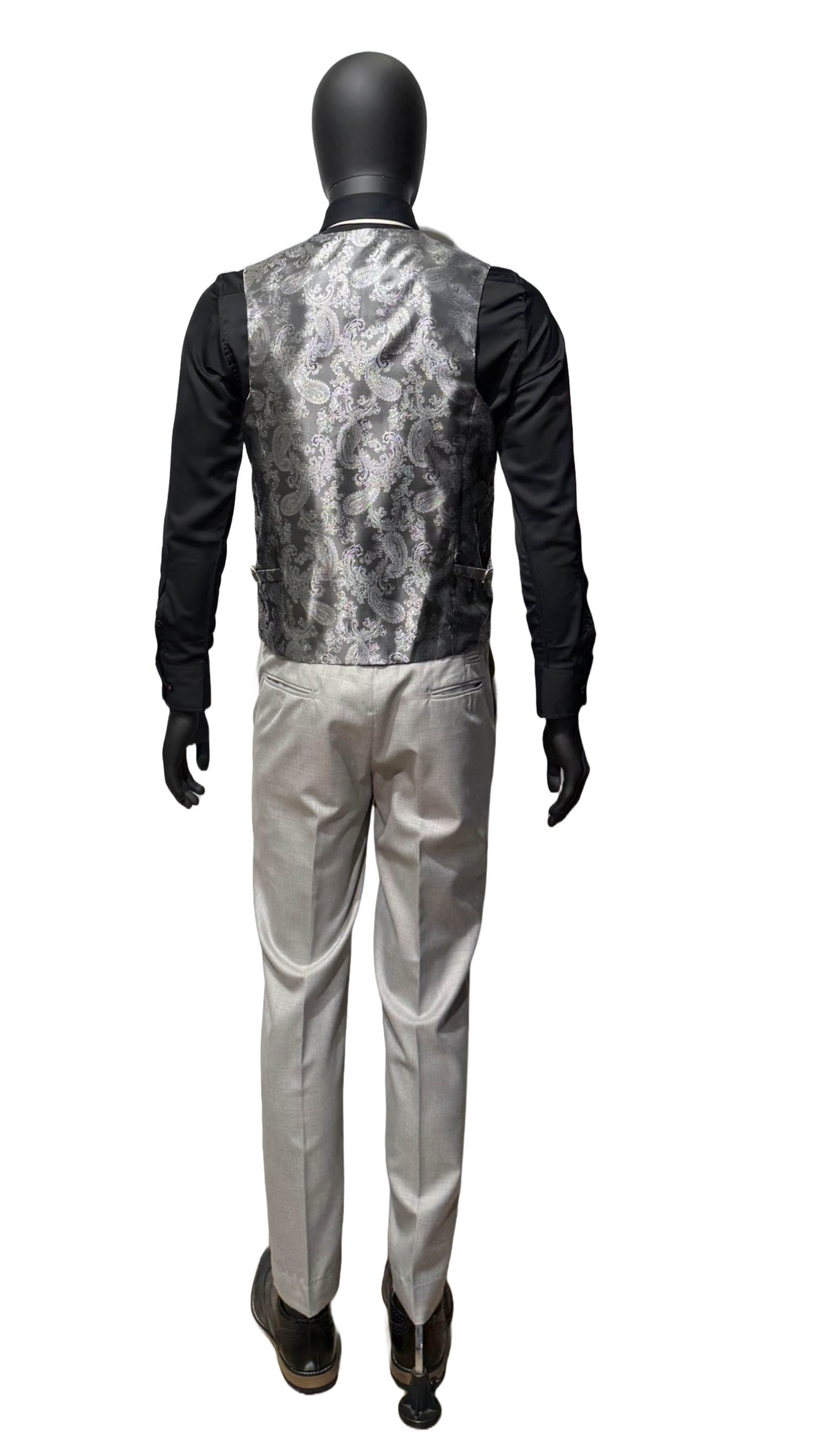Grey suit on a mannequin against a white background