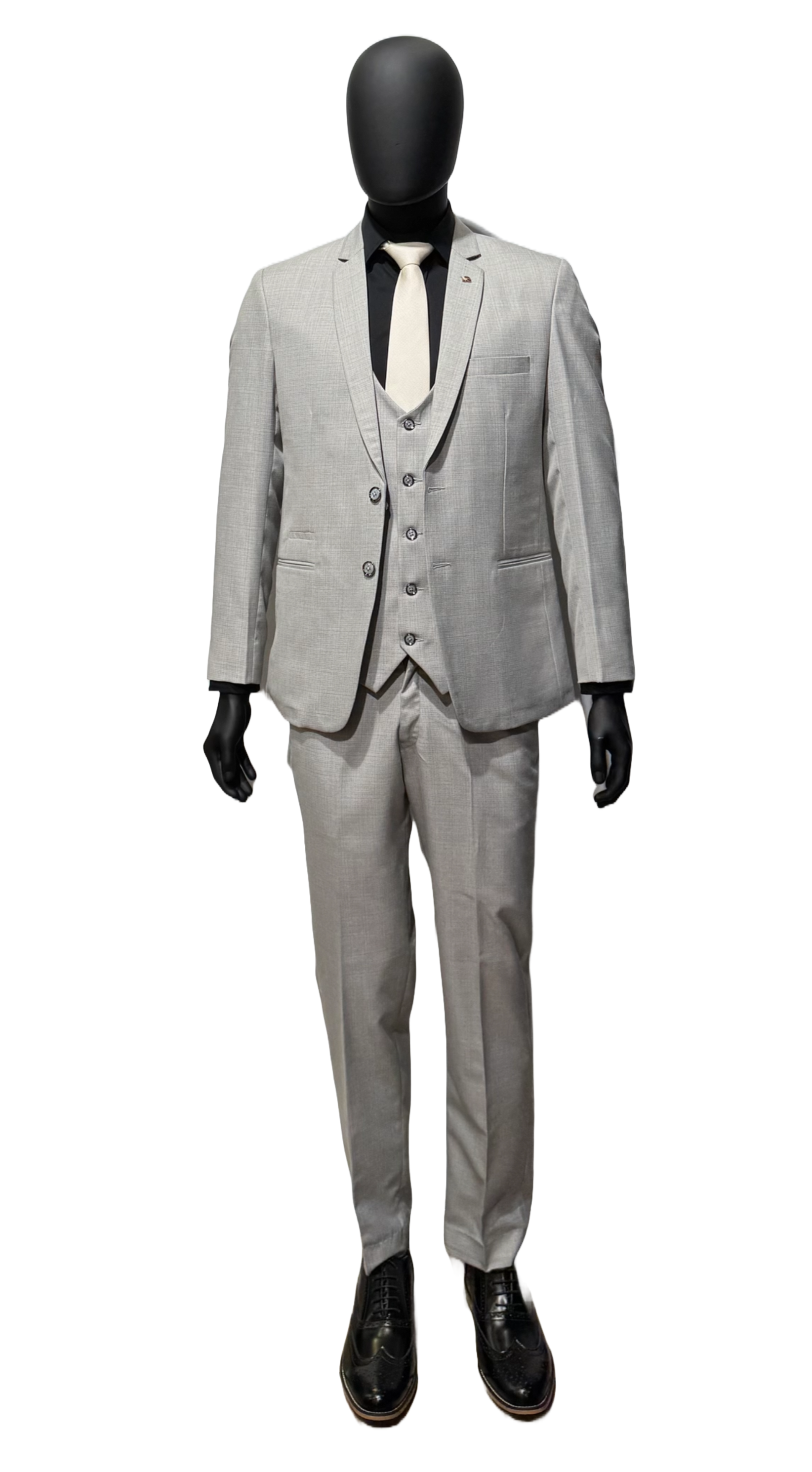 A three-piece light grey suit displayed on a mannequin, consisting of a jacket, trousers, and a tie.
