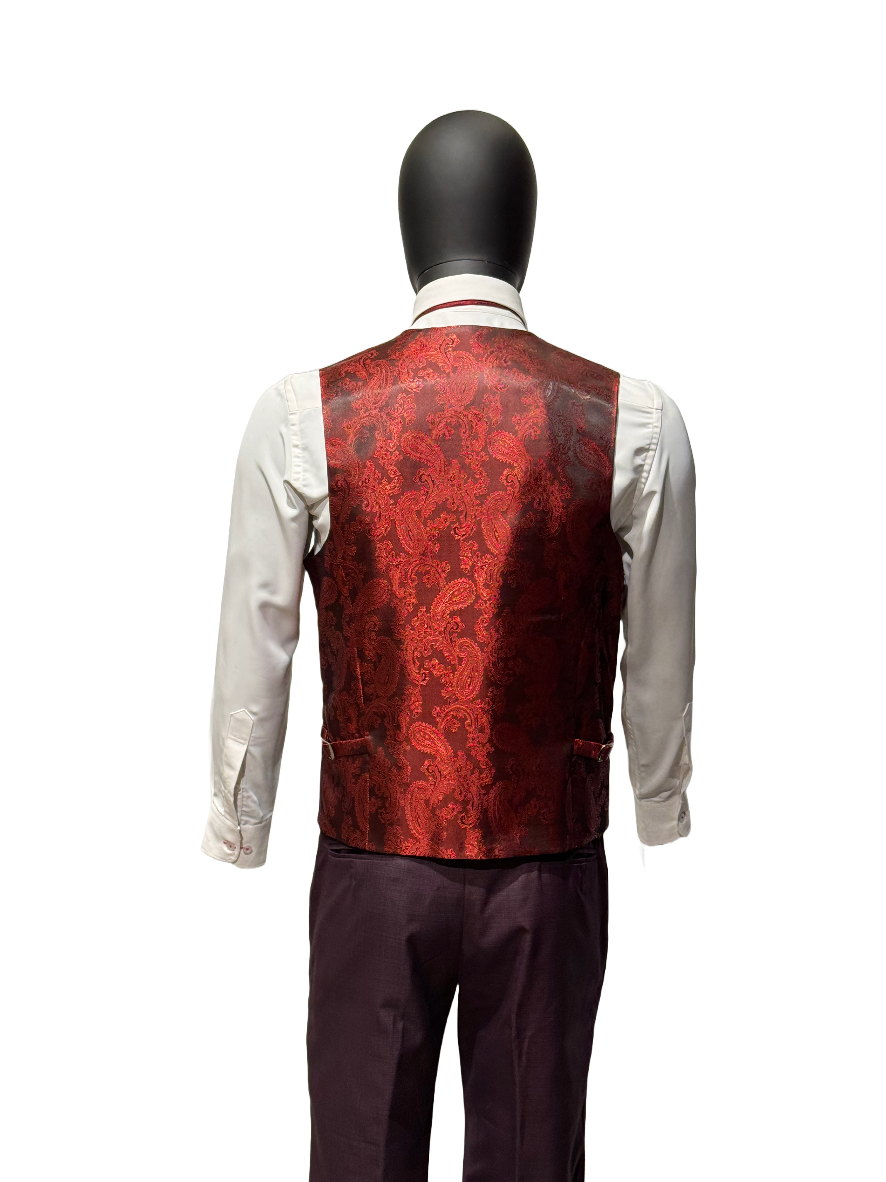 Red suit on a mannequin against a white background