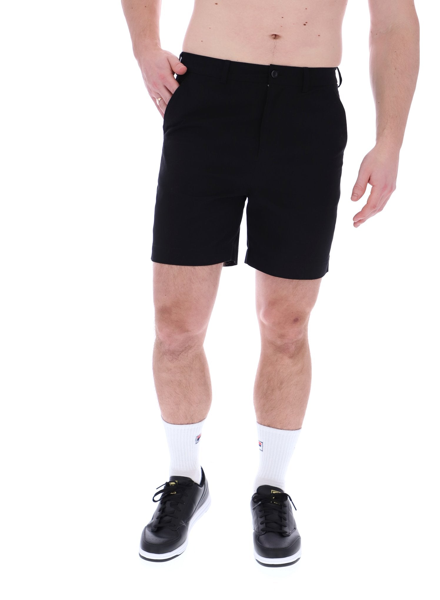 A pair of chino shorts in a black color, worn by a model standing against a plain background.