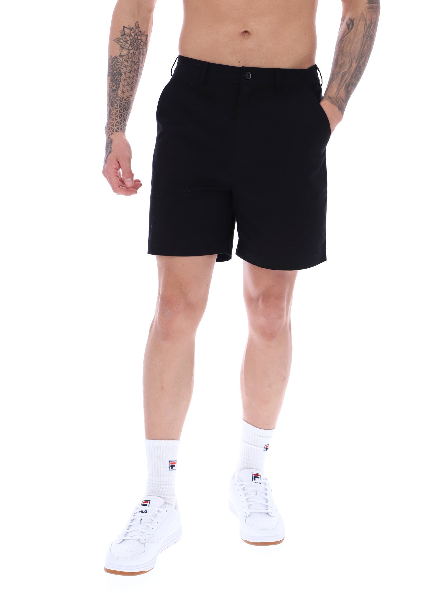 A pair of chino shorts in a black color, worn by a model standing against a plain background.
