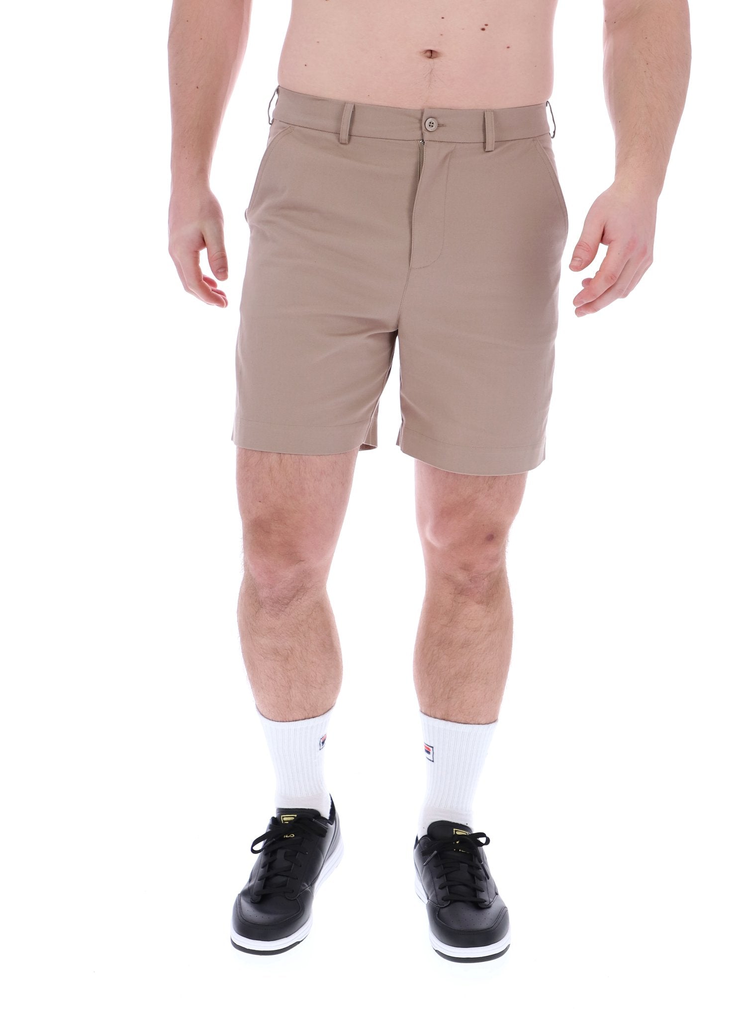 A pair of chino shorts in a neutral color, worn by a model standing against a plain background.