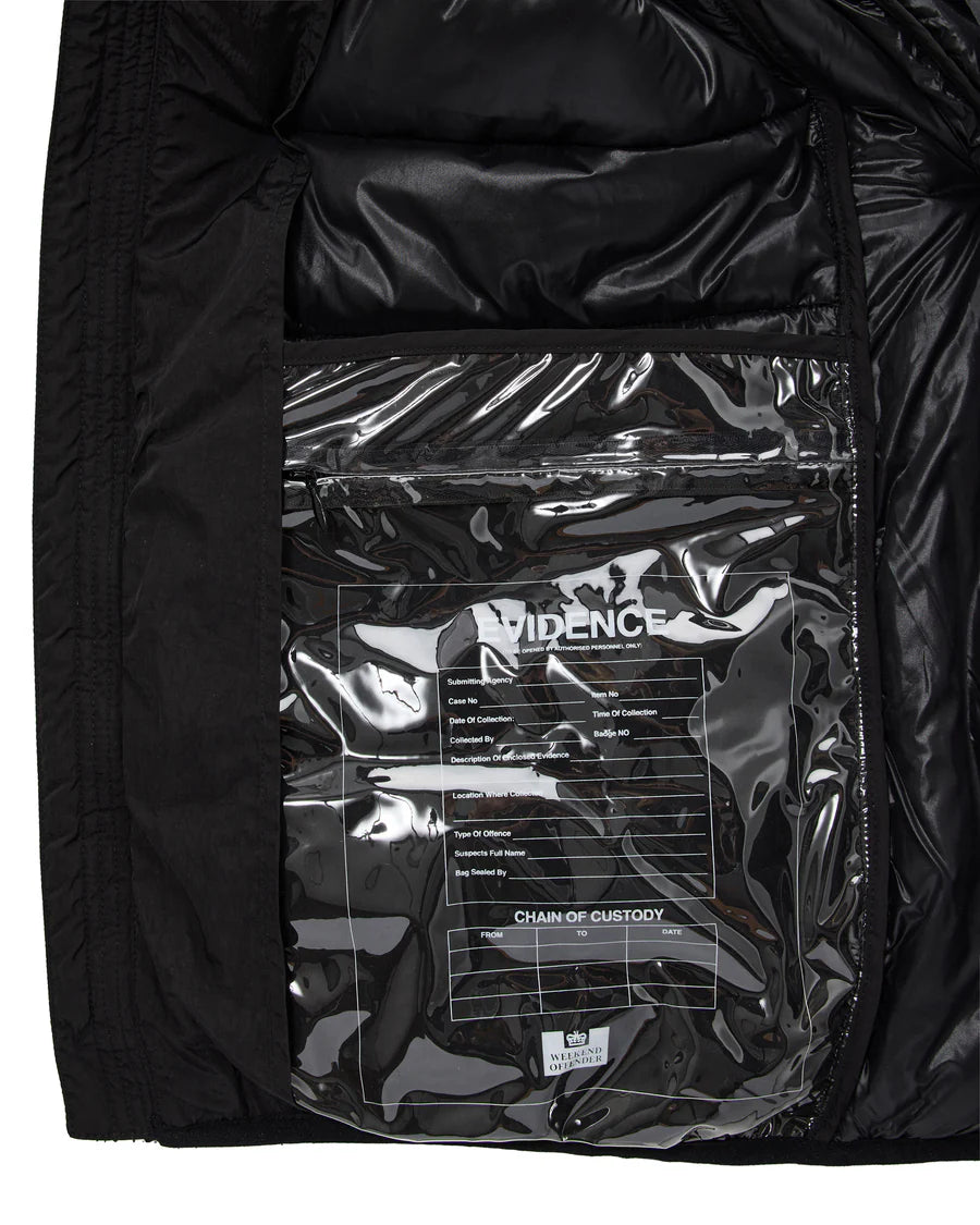 Black bag with a clear plastic window displaying text and logos.