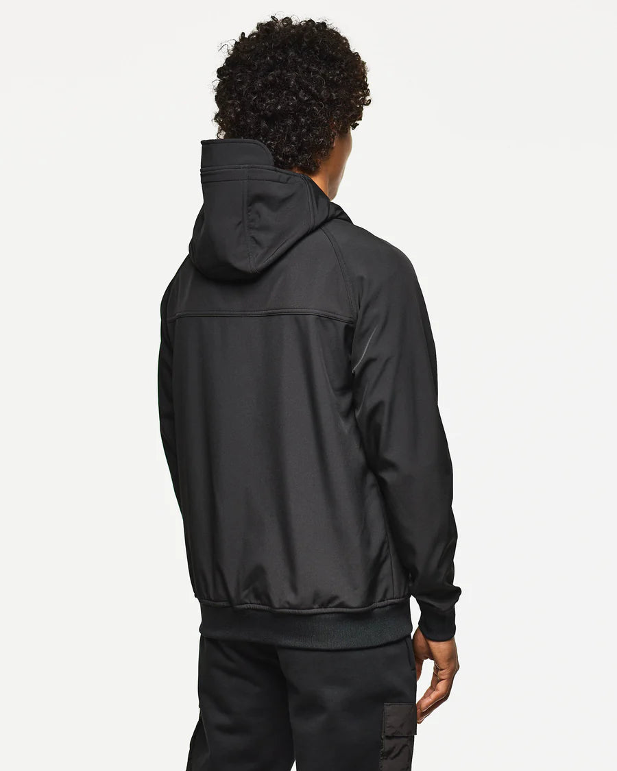 Person wearing a black jacket with a hood on a white background