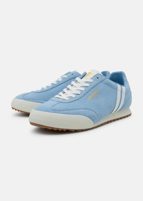 A pair of sky blue and white Patrick Rio trainers with a suede upper and a rubber sole, featuring white stripes and a gold logo.