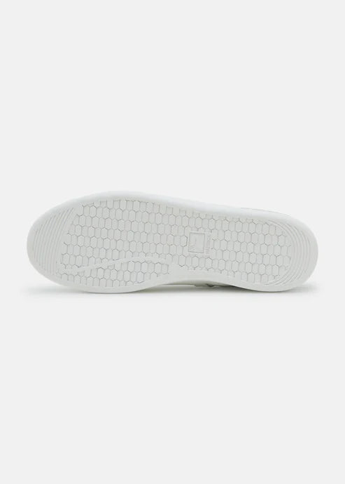 White Patrick trainers on a white background