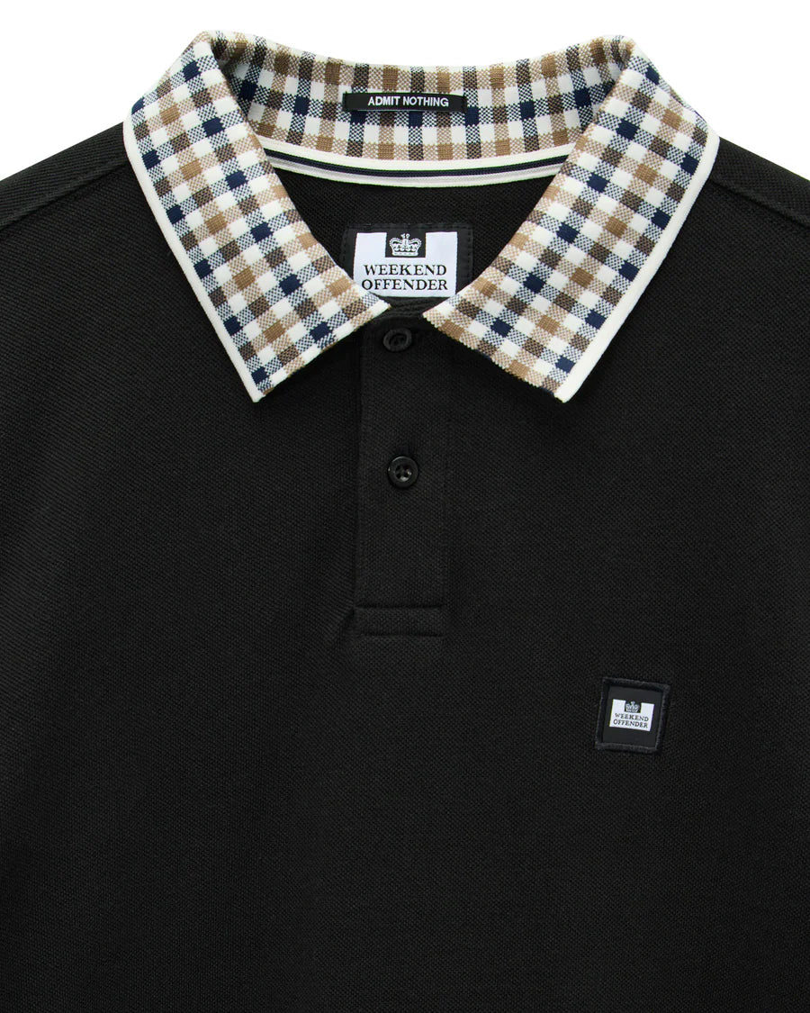 Black polo shirt with plaid collar and brand logo on a white background
