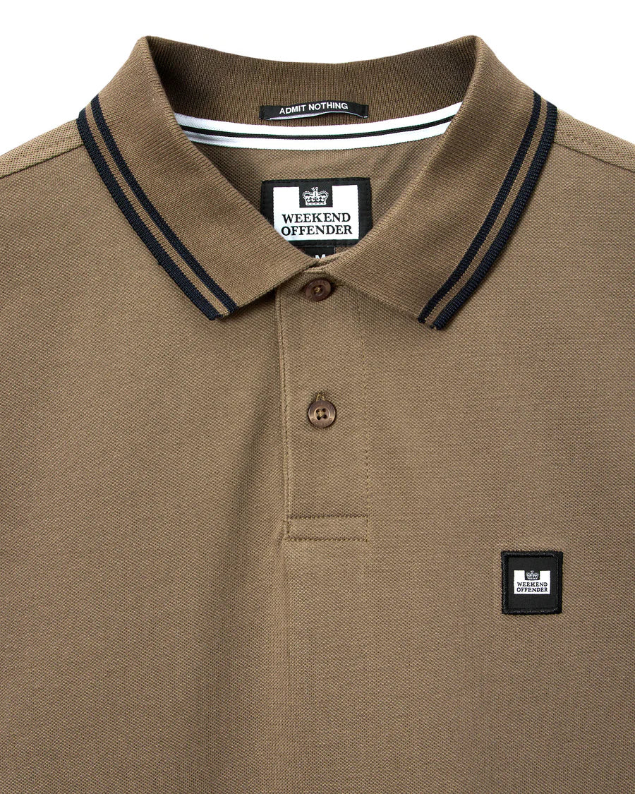 Brown polo shirt with black trim and Weekend Offender label on a white background