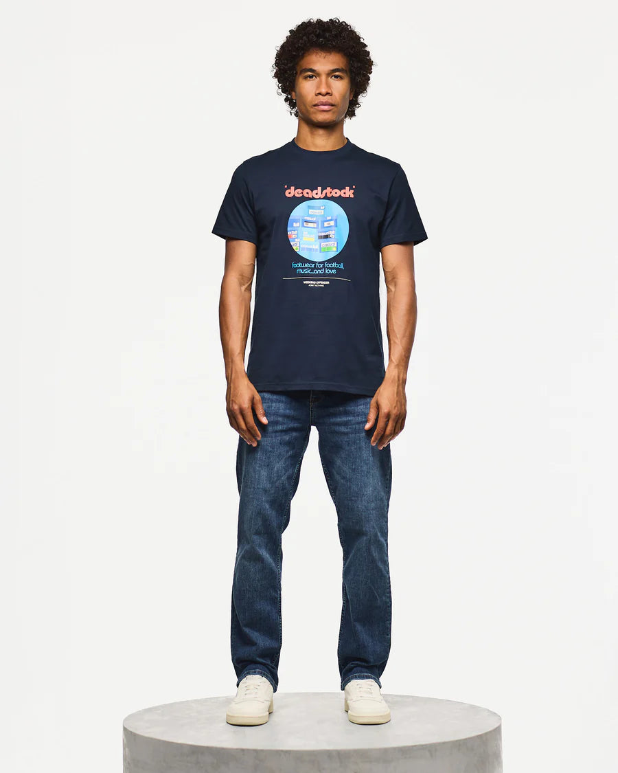 Person wearing a navy blue t-shirt with a graphic design on a white background