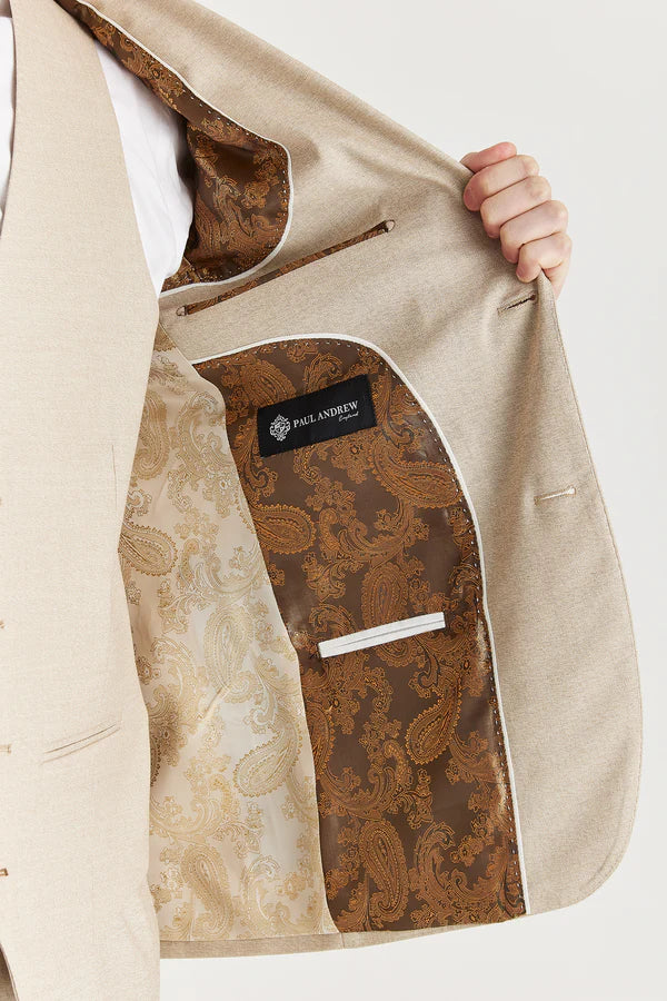 Beige suit jacket with brown paisley pattern on a white background