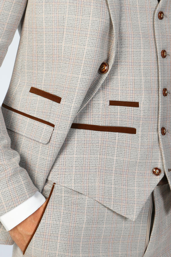 Close-up of a gray checkered suit with brown buttons and trim.