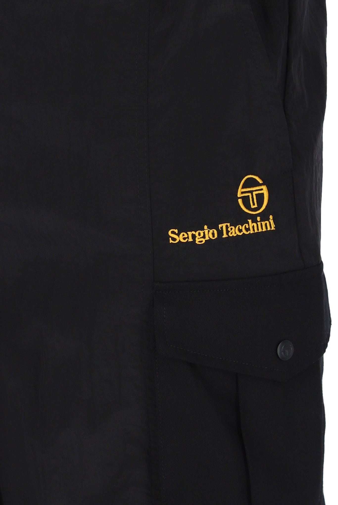 A pair of Sergio Tacchini Santino Cargo Shorts in black color, featuring side cargo pockets and embroidered branding on the left leg.