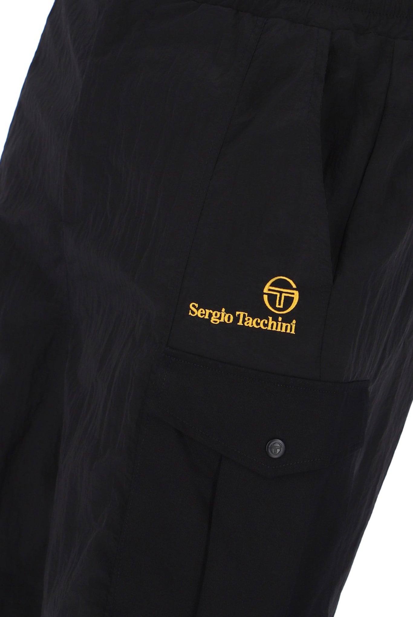 A pair of Sergio Tacchini Santino Cargo Shorts in black color, featuring side cargo pockets and embroidered branding on the left leg.