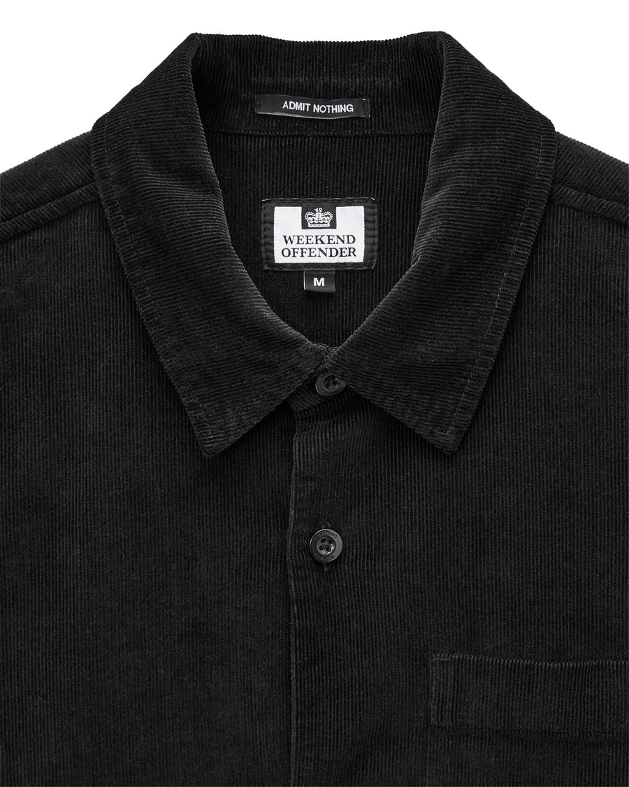 Black corduroy shirt with 'Weekend Offender' label on a white background