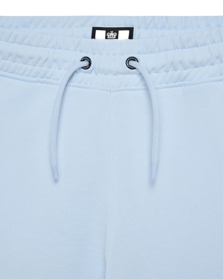 A pair of light blue Weekend Offender Mytros shorts with a high-density print on the leg, featuring angled side entry pockets, a back welt pocket with a concealed press stud fastening, and an elasticated waistband with an external tie cord.