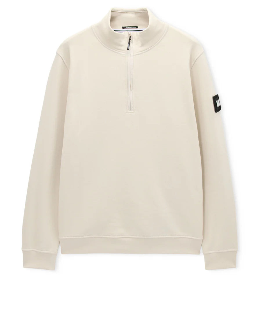 Beige sweatshirt with a brand logo on the sleeve against a white background