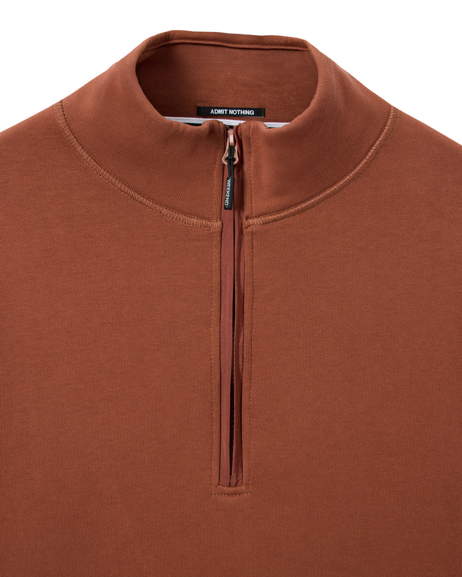 Brown fleece pullover with a quarter zip on a white background