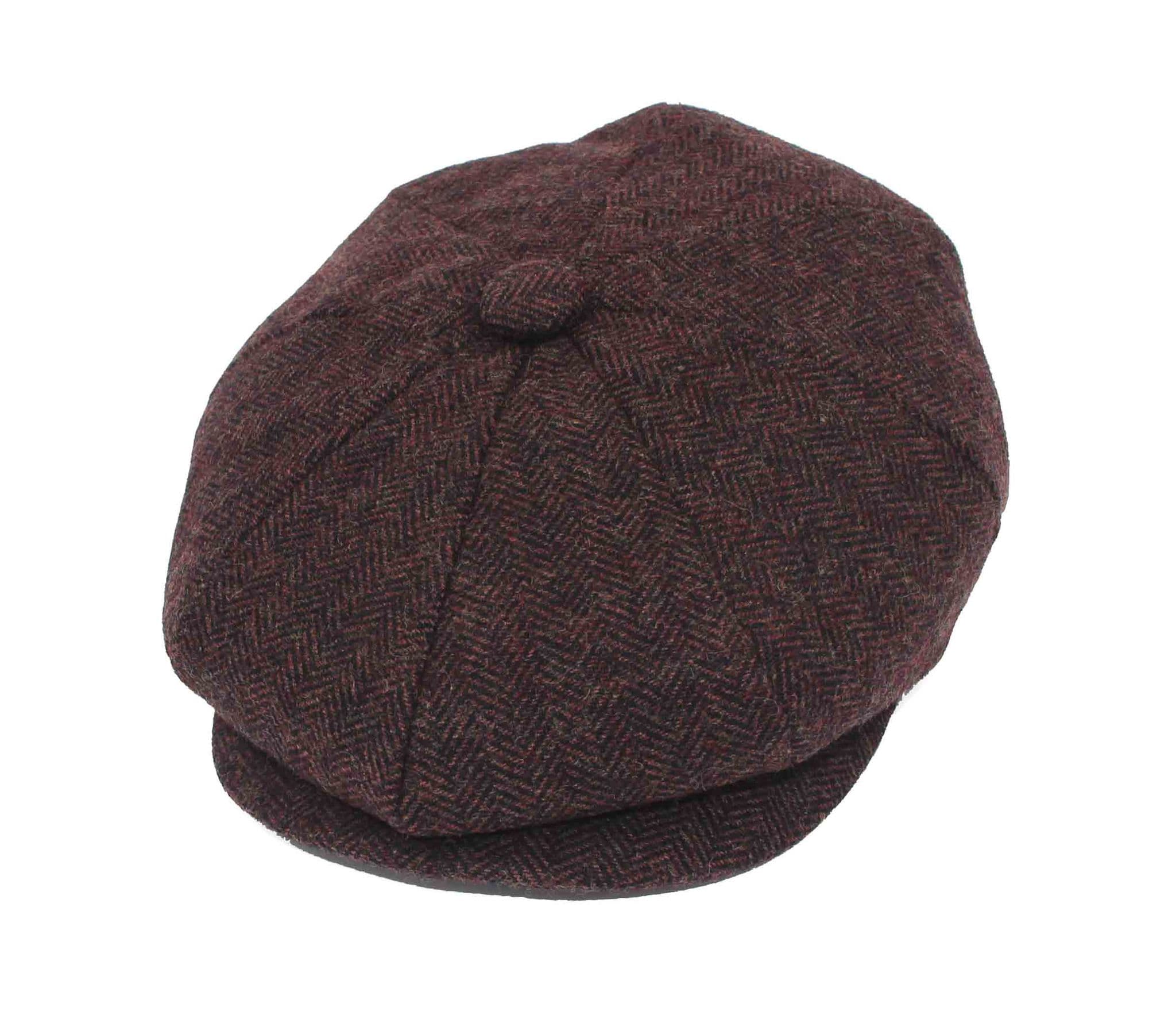 Brown flat cap on a white background