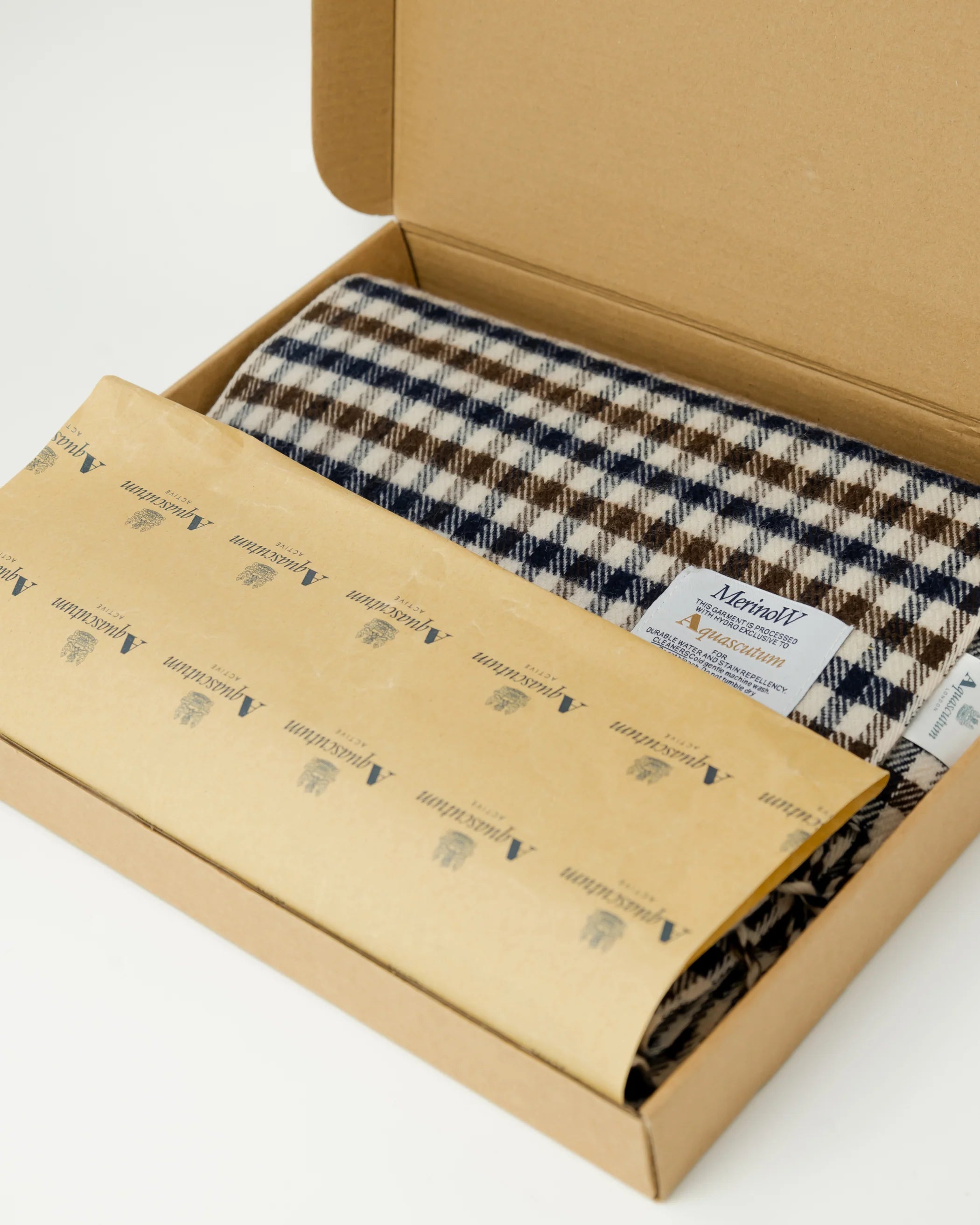 Scarf in a yellow box on a grey background