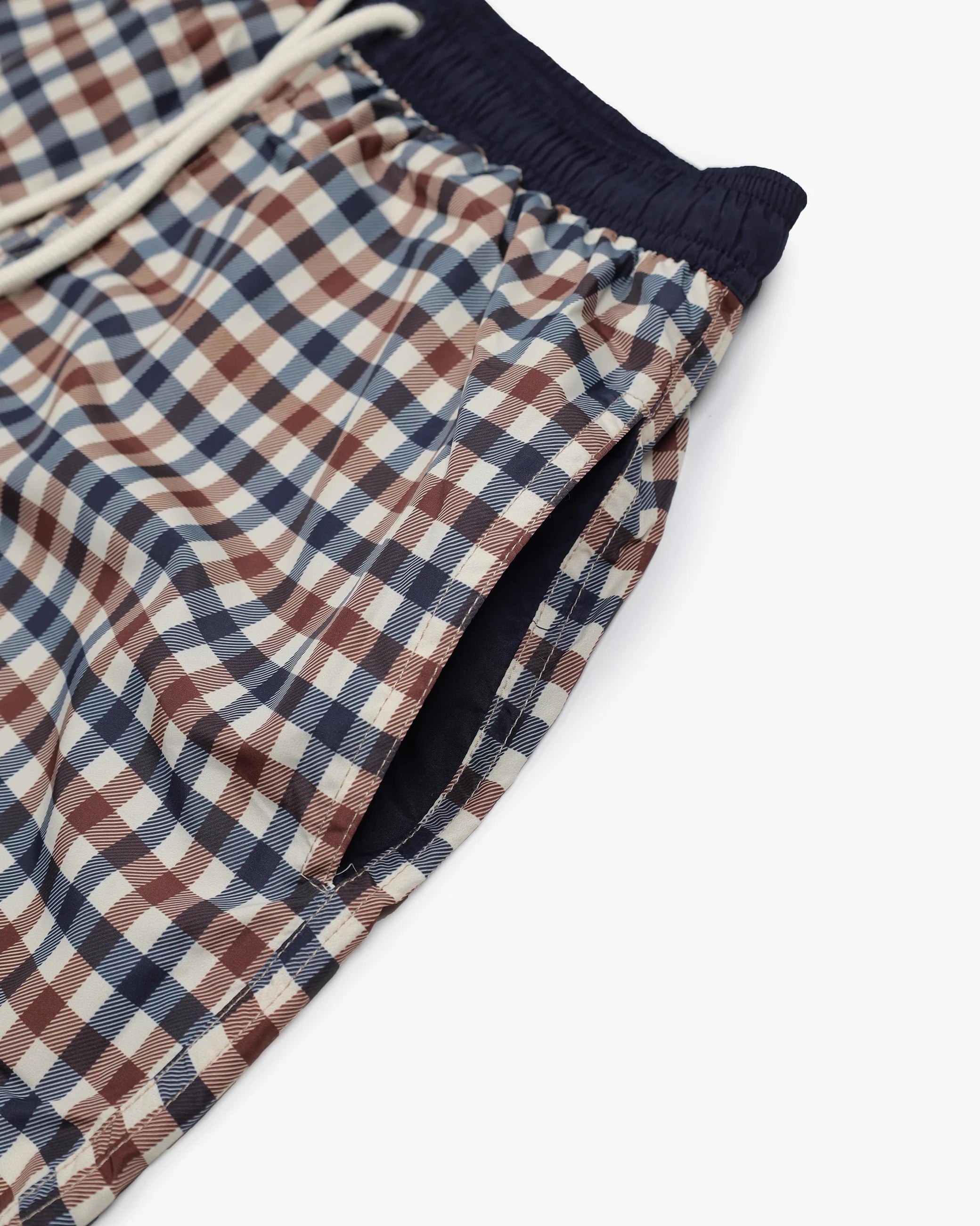 Plaid shorts with a drawstring on a white background