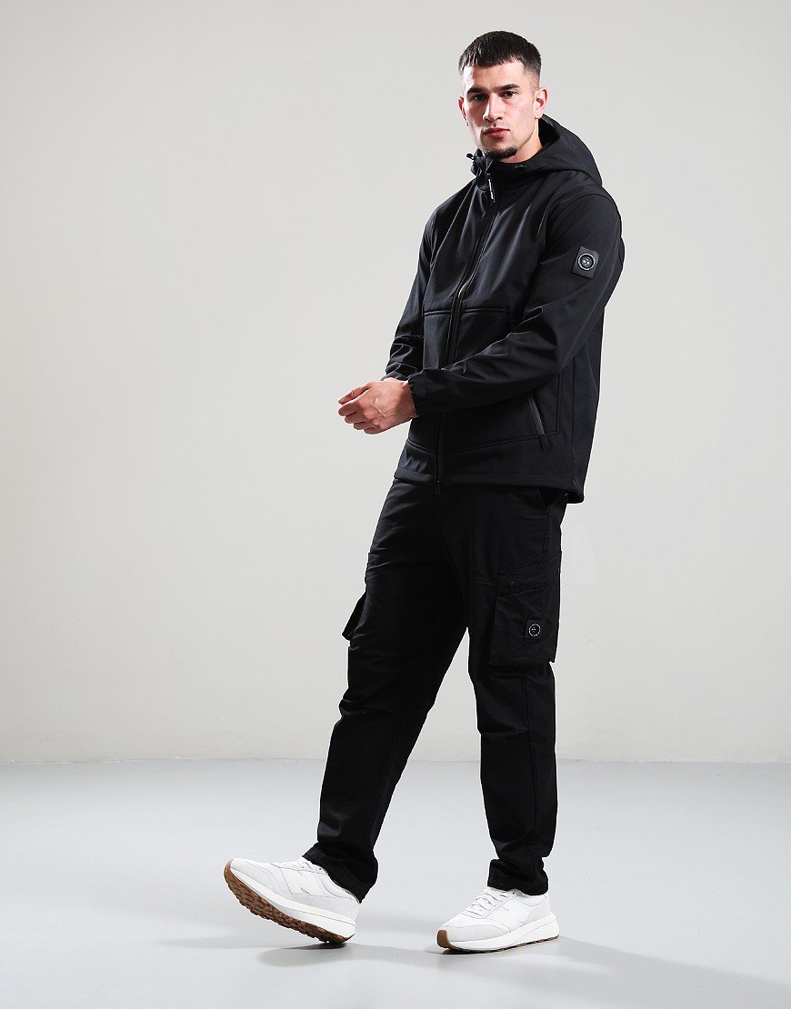 Man wearing a black jacket and pants with a hood on a white background