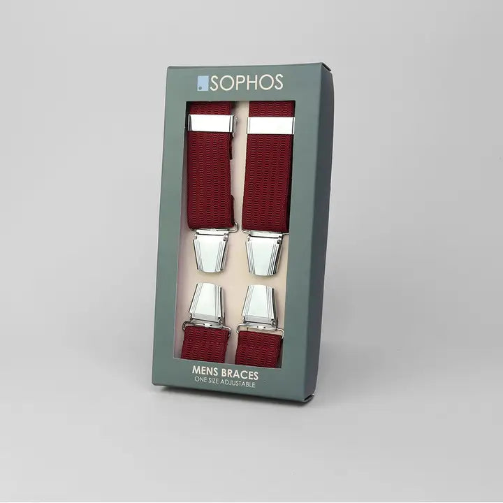 Box of men's braces with red straps and silver clips on a gray background