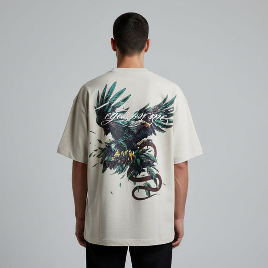 Person wearing a white t-shirt with a graphic design on the back, standing against a plain background