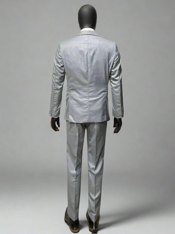Mannequin wearing a light gray suit on a plain background