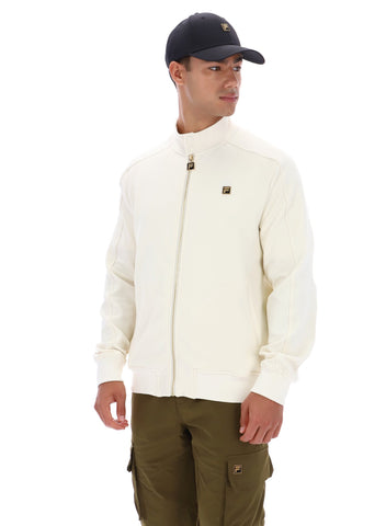 Man wearing a white jacket and green pants on a white background