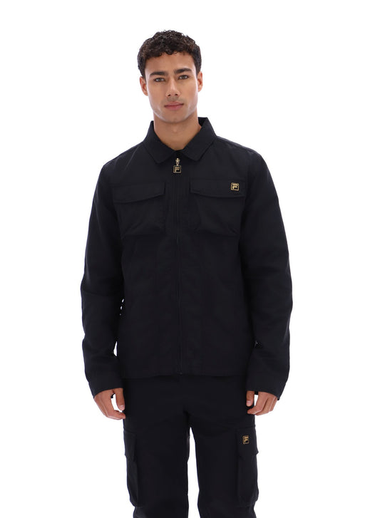 Man wearing a black jacket and pants on a white background