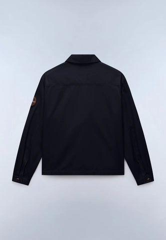 A black long-sleeve jacket shown from the back, featuring a small brown circular logo patch on the left sleeve, laid flat against a light gray background.