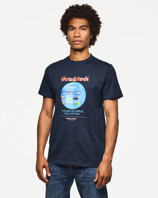 Man wearing a navy blue t-shirt with a graphic design on a white background