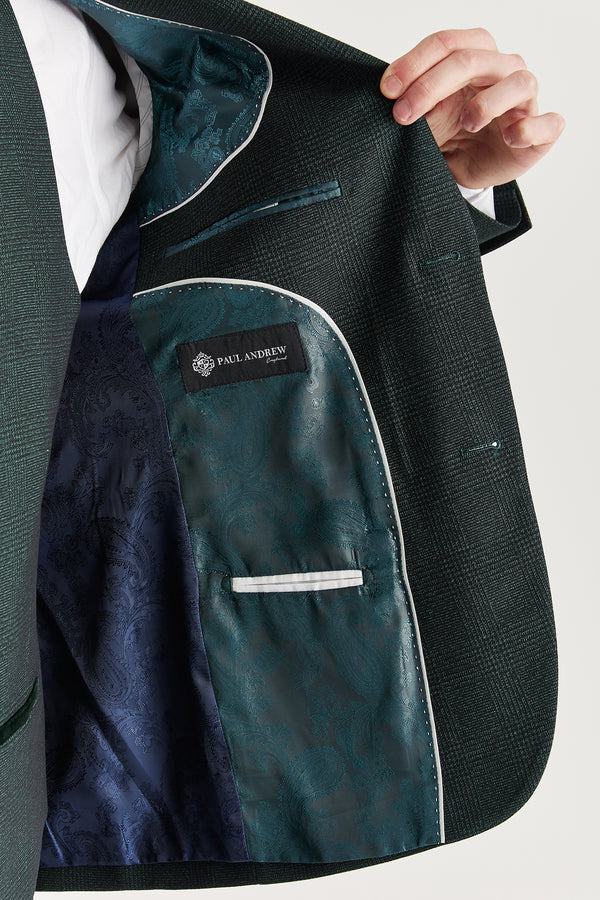 Green suit jacket with a visible brand label on a white background