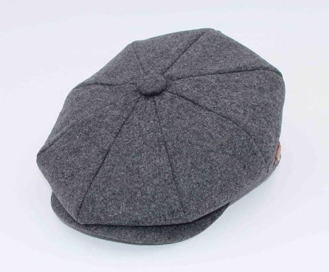 Gray newsboy cap on a white background